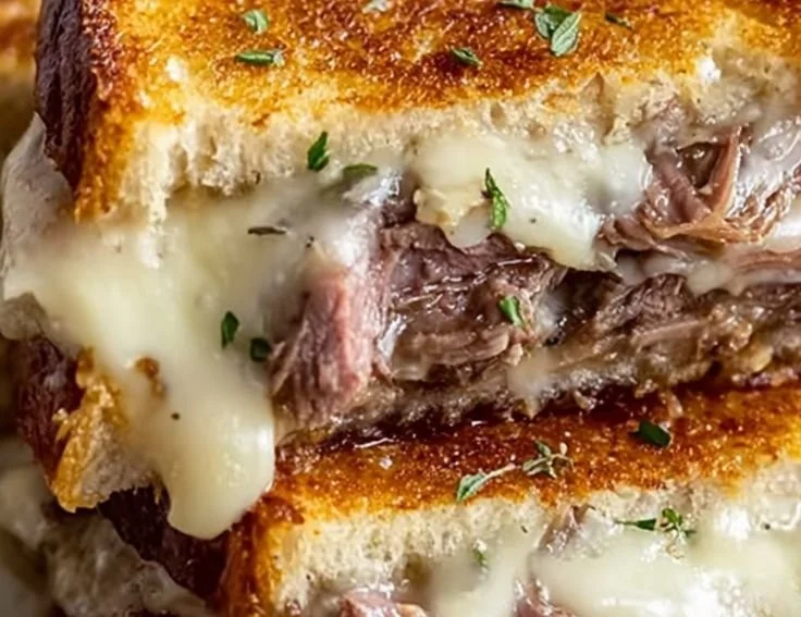 Mouthwatering French Dip Grilled Cheese sandwich with beef and melted cheese