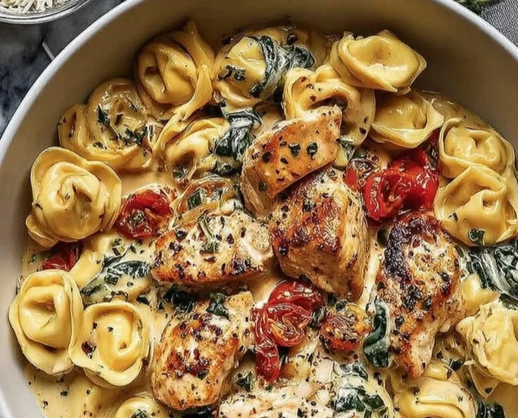 Creamy Marry Me Chicken Tortellini served with fresh herbs and garnishes