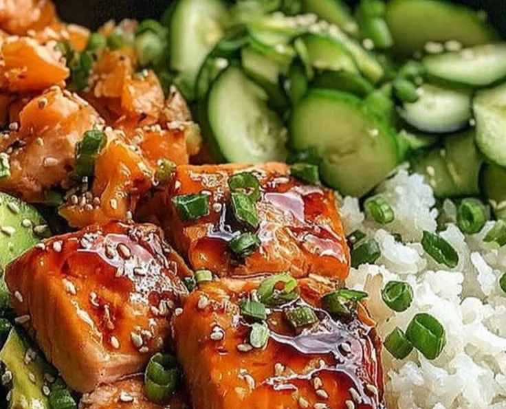 Healthy salmon rice bowl with fresh vegetables and rice