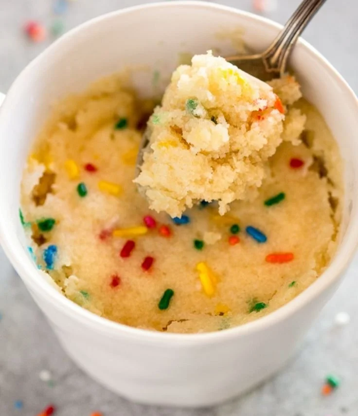 Delicious vanilla mug cake served in a microwave-safe mug
