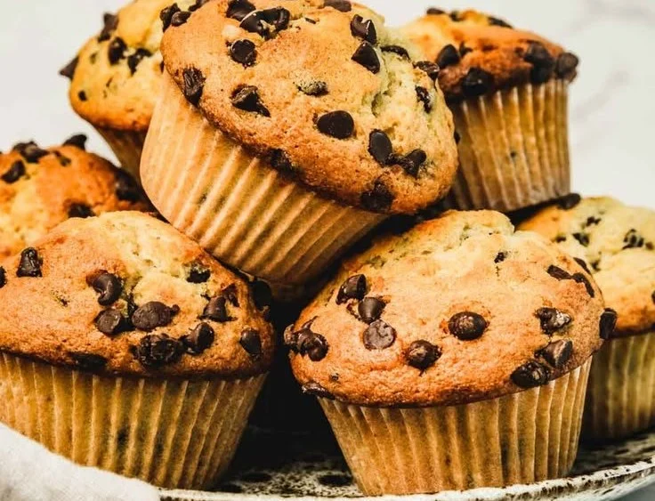 Bakery-style chocolate chip muffins fresh out of the oven