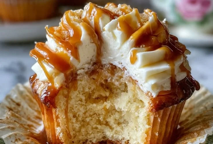 Delicious Butterbeer Cupcakes topped with creamy frosting and butterscotch drizzle.
