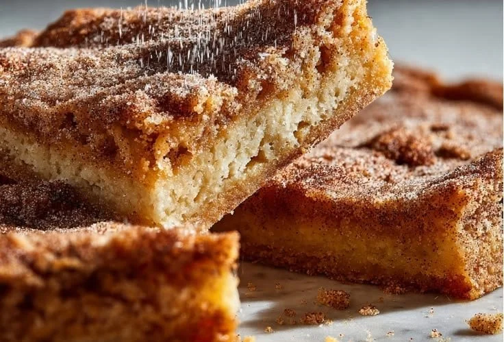 Delicious Cinnamon Sugar Blondies topped with cinnamon and sugar