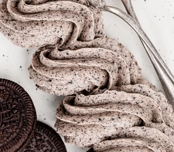 Delicious Cookies and Cream Frosting on chocolate cupcakes