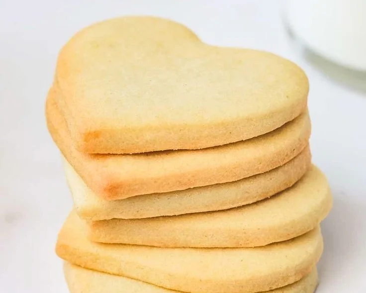Delicious cut-out sugar cookies decorated with colorful icing and sprinkles.