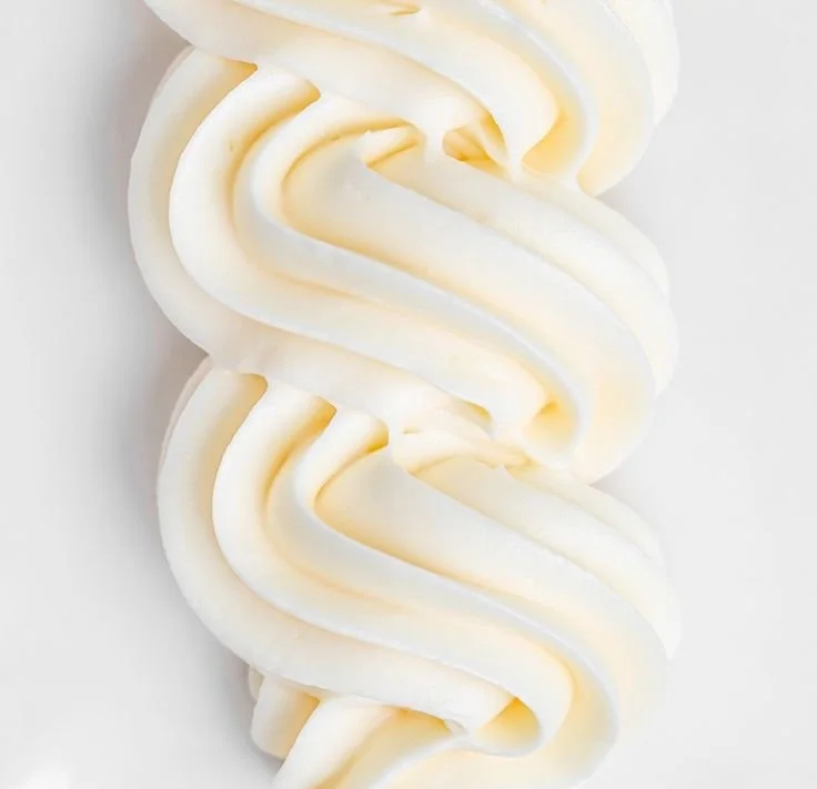 Delicious easy cream cheese frosting on a chocolate cupcake