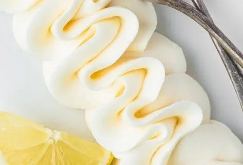 Delicious homemade easy lemon frosting on a cupcake.