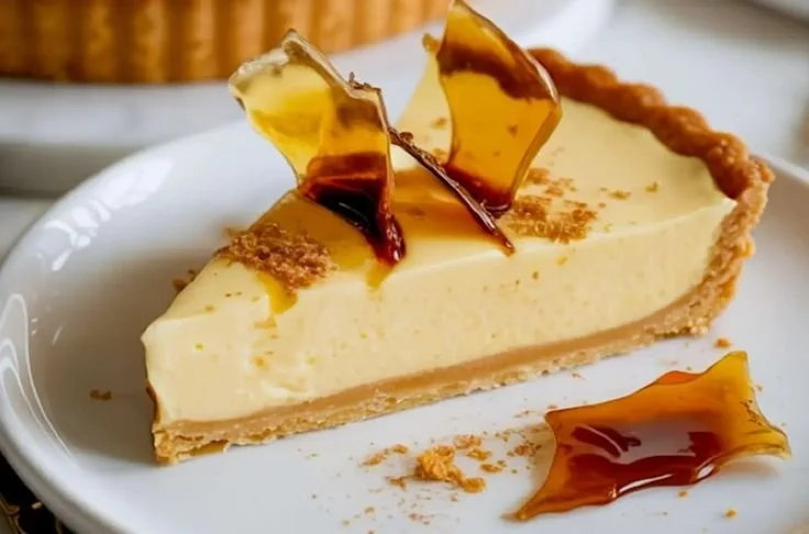 Delicious Eggnog Crème Tart with creamy filling and festive decorations