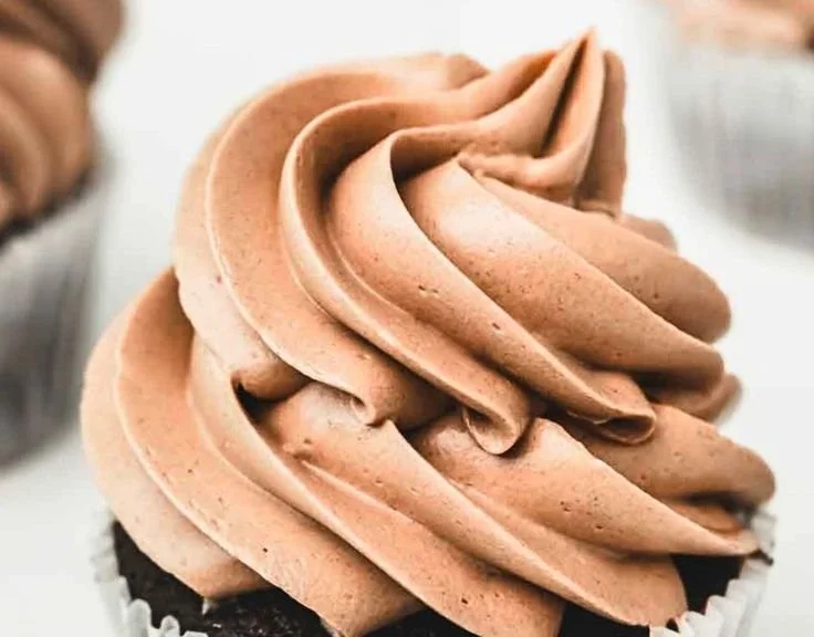 Delicious Nutella Buttercream Frosting on a chocolate cupcake