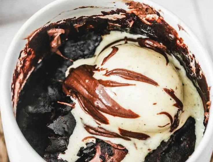 Delicious Nutella Mug Cake served in a mug with a spoon