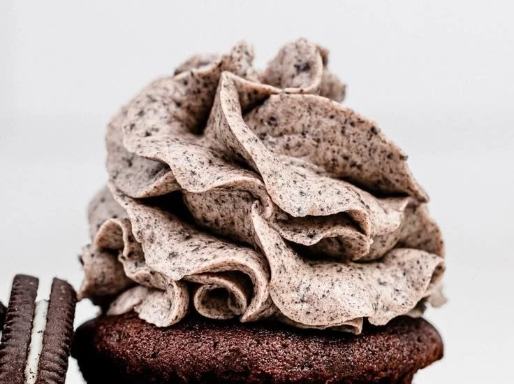 Delicious Oreo buttercream frosting on a chocolate cupcake