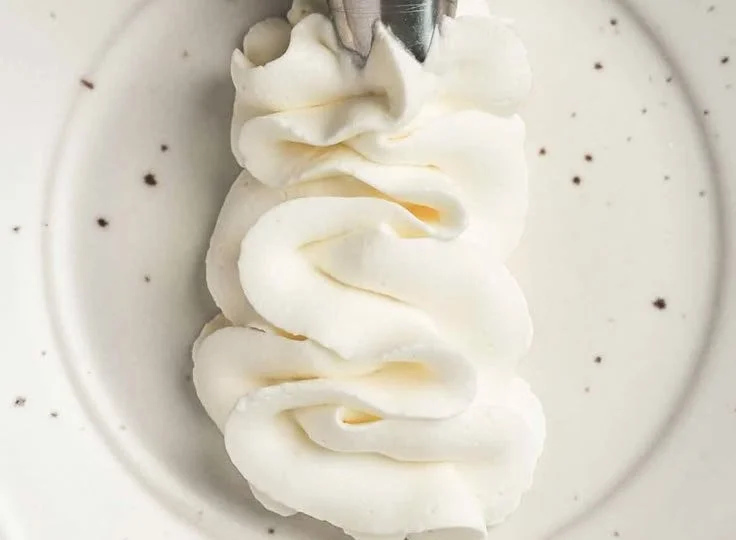 Delicious stabilized whipped cream cheese frosting for desserts