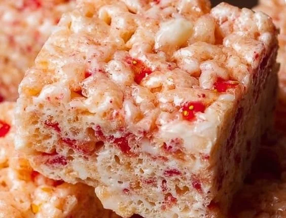 Deliciously colorful Strawberry Rice Krispie Treats on a plate