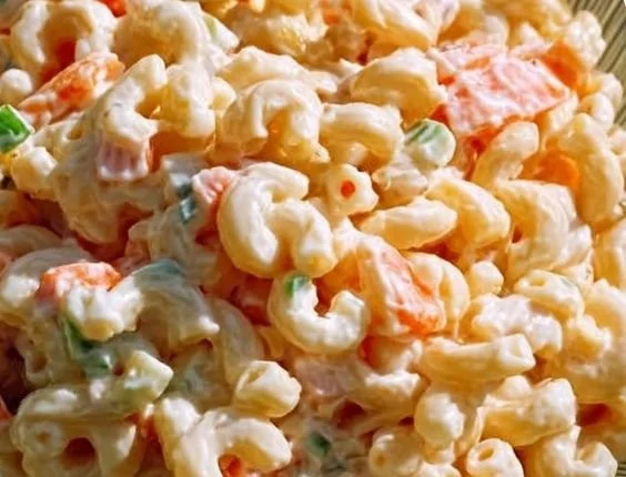 Plate of traditional Hawaiian macaroni salad with macaroni, mayo, and veggies