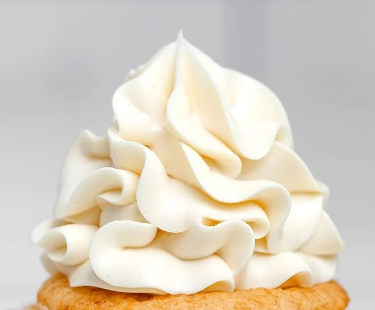 Delicious Vanilla Swiss Meringue Buttercream on a cake
