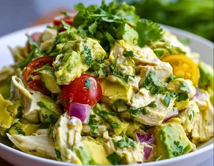 Delicious Avocado Chicken Salad served in a bowl with fresh ingredients