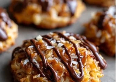Homemade Samoas cookies topped with caramel and coconut