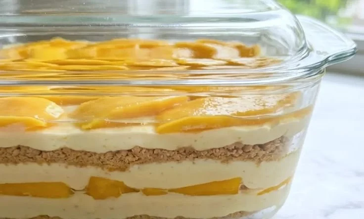 Delicious Chilled Mango Float dessert recipe with mangoes and cream