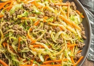 Delicious Chinese ground beef stir-fry with cabbage in a skillet