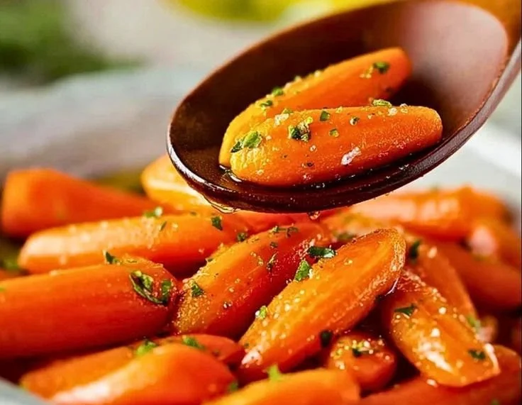 Bowl of classic honey glazed carrots ready to serve as a delicious side dish