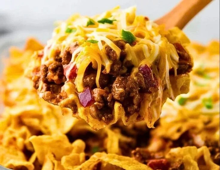 Delicious Frito Pie served in a bowl with toppings