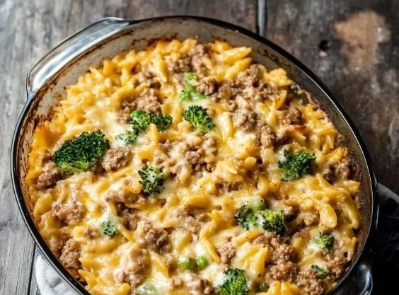 Delicious ground turkey orzo recipe served in a bowl with fresh vegetables.