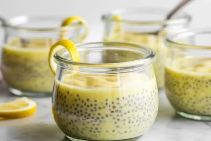 Delicious lemon chia pudding served in a bowl, topped with fresh fruit.