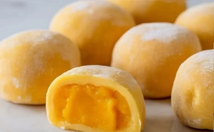Delicious Mango Mochi dessert featuring chewy rice cake with mango filling.