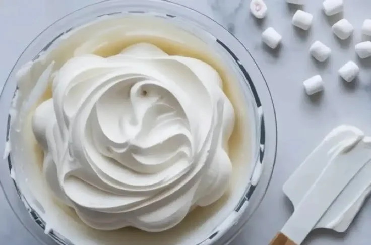 Homemade marshmallow filling for cakes, perfect for enhancing dessert flavors.