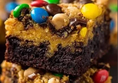 Delicious Monster Cookie Fudgy Brownies with chocolate and colorful M&Ms