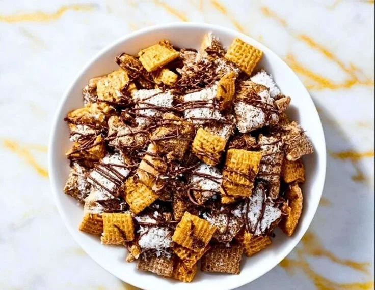 Samoas Puppy Chow recipe featuring chocolate, peanut butter, and coconut.