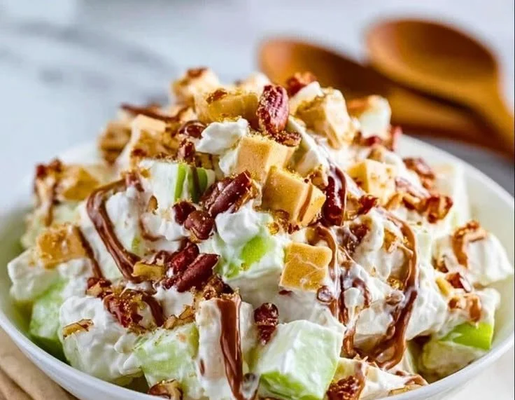Delicious Snicker Apple Salad with apples, caramel, and chocolate