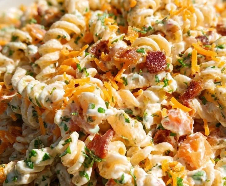 Bacon Ranch Pasta Salad served in a bowl with fresh ingredients and dressing