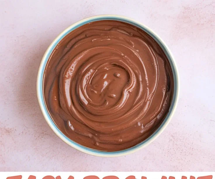 Delicious brownie batter dip served in a bowl with dipping snacks