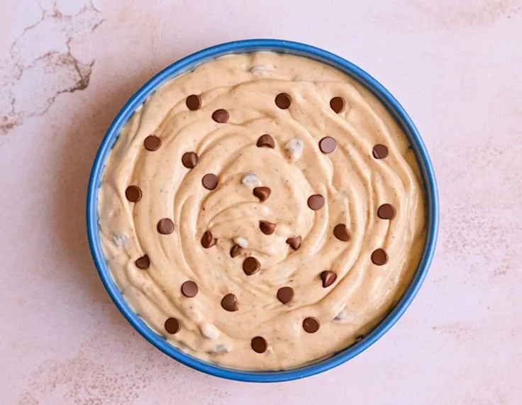 Delicious homemade Cookie Dough Dip in a bowl with chocolate chips