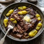 Delicious Mississippi Pot Roast served with vegetables and gravy