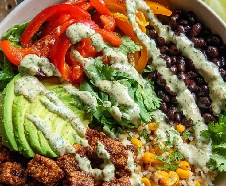 Spicy Baked Tofu Burrito Bowl with colorful toppings and fresh ingredients